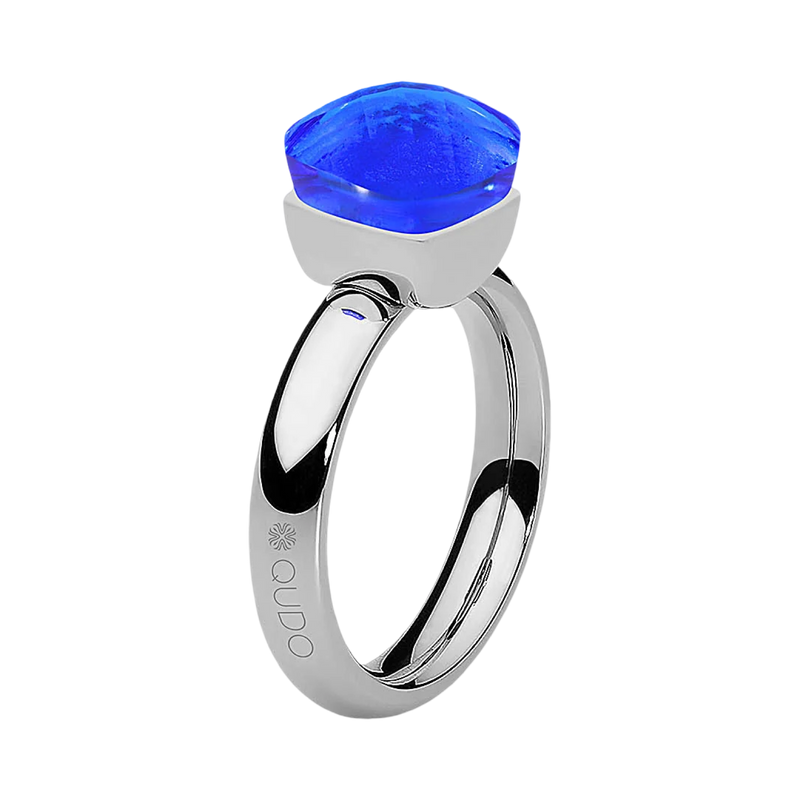 Silver ring with a blue gemstone on a white background