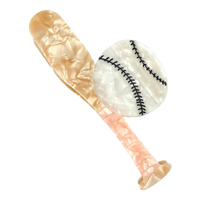 Baseball-inspired acetate claw clip designed as a playful game-day hair accessory.