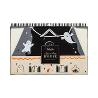 Halloween-themed advent calendar with ghost and house design on a white background