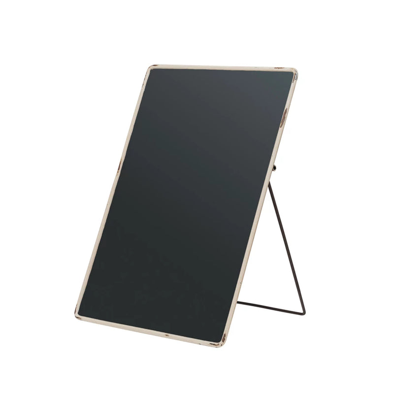 Black electronic display board with stand on a white background