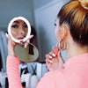 mini lighted compact mirror, LED compact mirror, travel makeup mirror, magnifying makeup mirror, purse-size mirror, beauty mirror with lights, 10X magnification compact, 7X magnification mirror, on-the-go beauty tools
