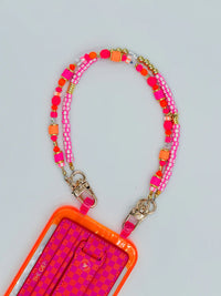 beaded phone wristlet, neon phone charm, hot pink orange phone strap, Vega strap, evil eye phone charm, gold phone chain, handmade in Cape Cod, beaded tech accessories, Detach case compatible, colorful phone accessory, trendy phone wristlet, fun phone holder, bright tech jewelry, star charm strap
