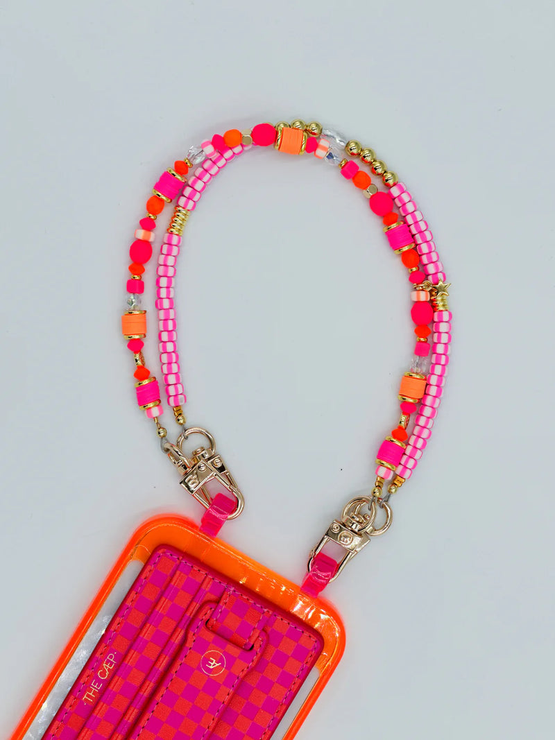 beaded phone wristlet, neon phone charm, hot pink orange phone strap, Vega strap, evil eye phone charm, gold phone chain, handmade in Cape Cod, beaded tech accessories, Detach case compatible, colorful phone accessory, trendy phone wristlet, fun phone holder, bright tech jewelry, star charm strap

