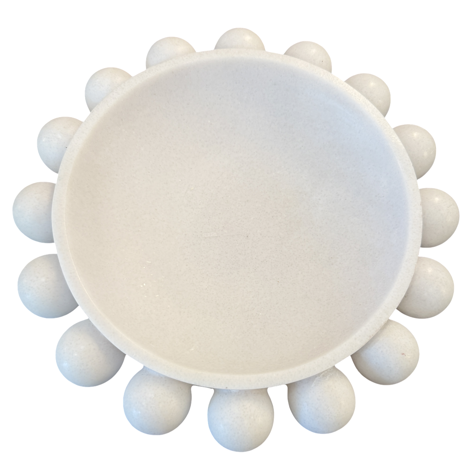 A white ceramic or stone round dish with a raised rim and multiple small rounded protrusions around the edge, shown on a plain white background.