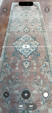 One-of-a-kind vintage Persian runner rug measuring approximately 2'11" x 12'5" with a faded dusty rose ground, blue and turquoise medallion motifs, ivory border and timeworn details.