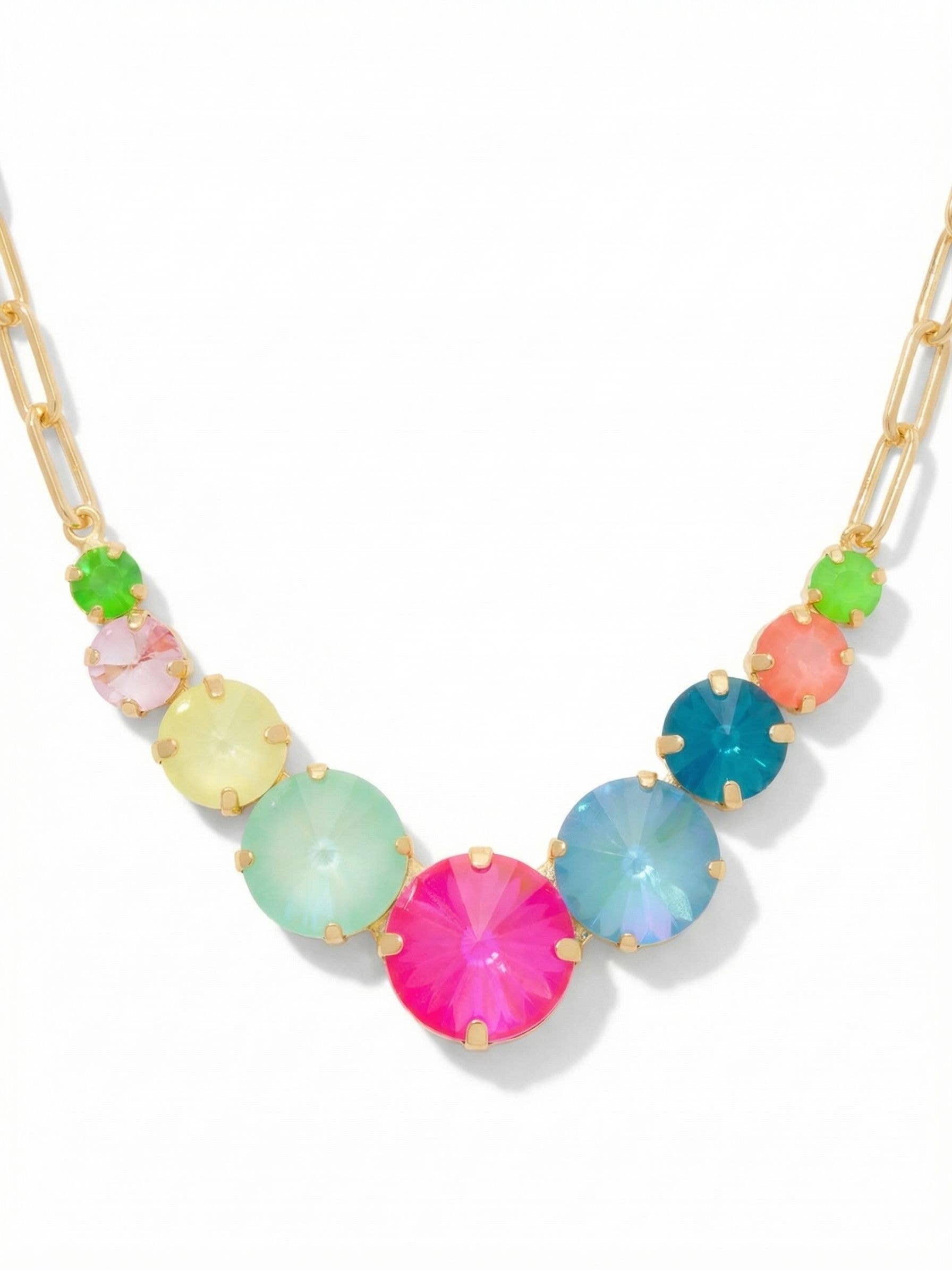 Sorrelli Calista Tennis Necklace with nine colorful faceted crystals on a bright gold-tone paperclip chain
