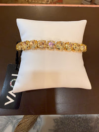 TOVA Oakland Stretch Bracelet in Solid Lemon Medium featuring vibrant yellow crystals set in antique gold-plated brass.