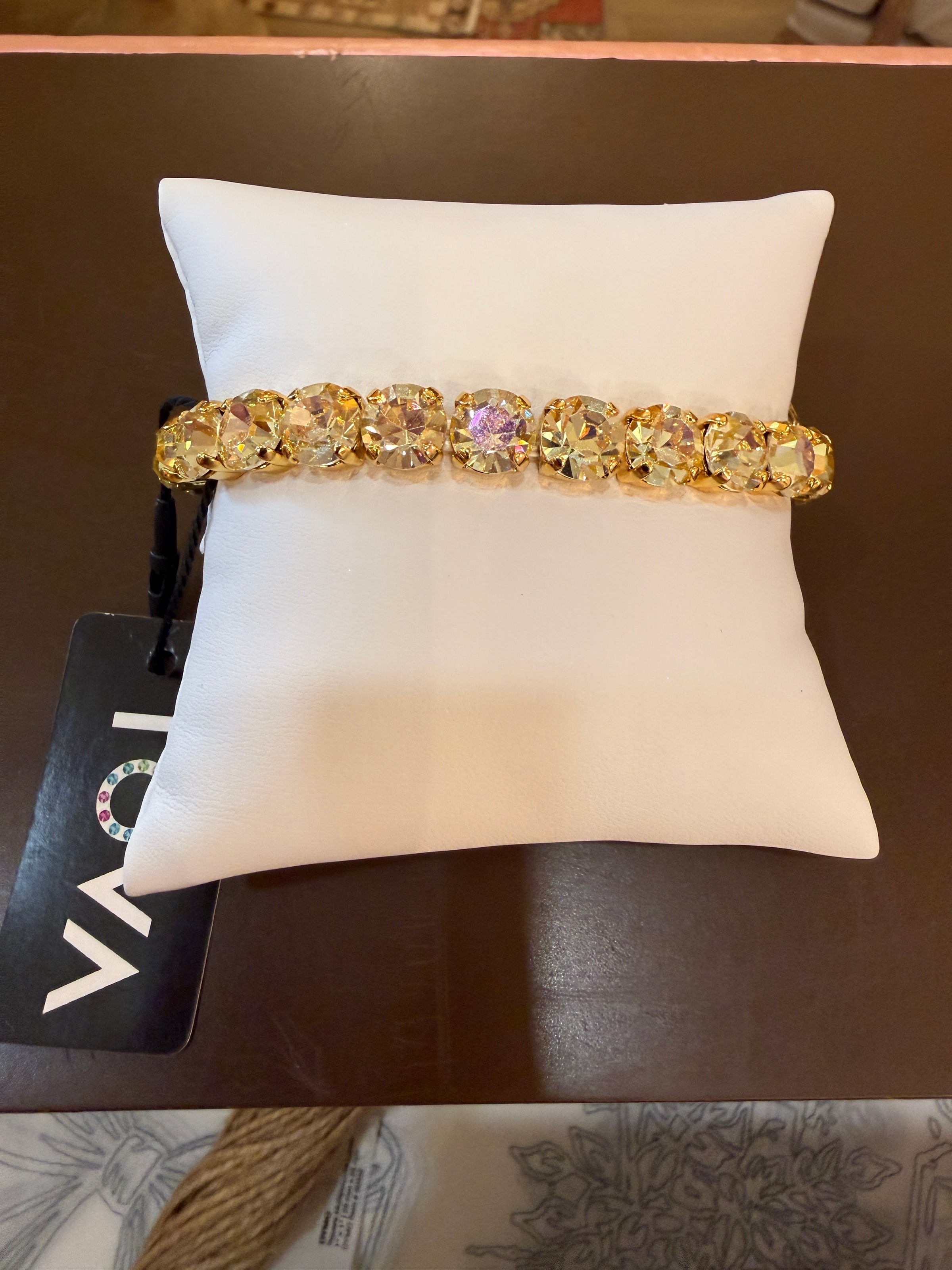 TOVA Oakland Stretch Bracelet in Solid Lemon Medium featuring vibrant yellow crystals set in antique gold-plated brass.