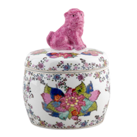 Decorative ceramic jar with floral patterns and a pink cat-shaped handle on a white background