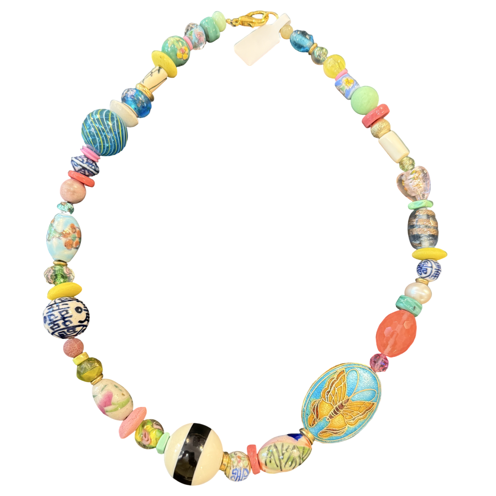 Colorful beaded necklace with various shapes and patterns on a white background