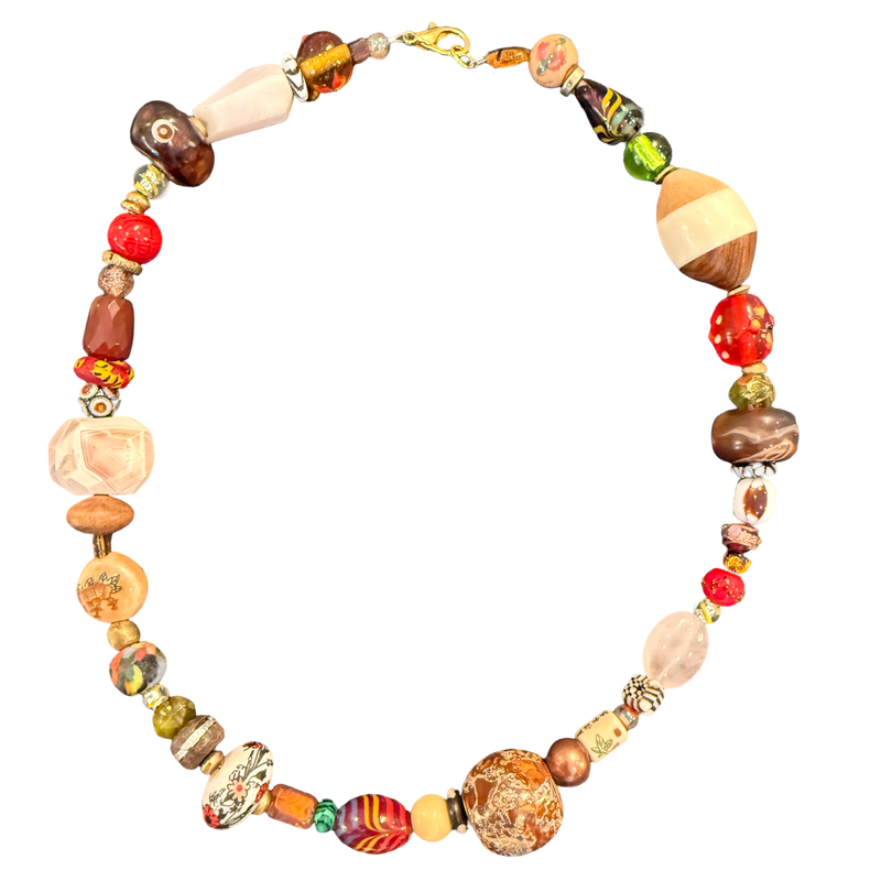one of one necklace, collected bead necklace, artisan necklace, statement bead necklace, earthy jewelry, maximalist jewelry, wearable art necklace, eclectic jewelry, chunky bead necklace, resort jewelry, boho luxury jewelry, curated accessories, globally inspired jewelry, boutique jewelry, fashion jewelry, artistic statement necklace, vintage inspired jewelry, collector style jewelry, unique artisan necklace, earthy statement accessories