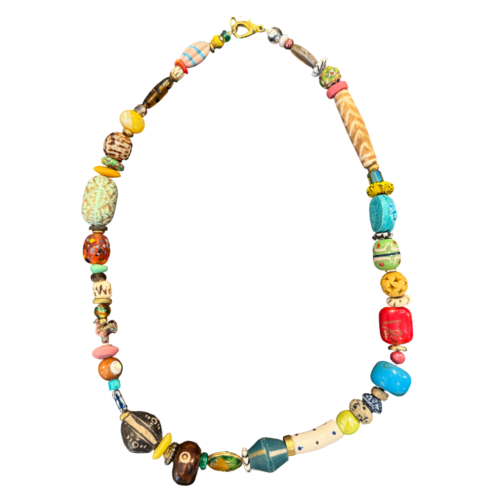 one of one necklace, collected bead necklace, artisan necklace, statement bead necklace, maximalist jewelry, wearable art necklace, eclectic jewelry, turquoise statement necklace, carved bead necklace, resort jewelry, boho luxury jewelry, chunky bead necklace, globally inspired jewelry, boutique jewelry, fashion jewelry, curated accessories, travel inspired necklace, colorful statement necklace, collector style jewelry, unique artisan necklace