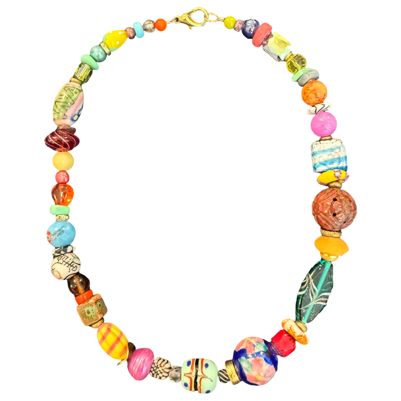one of one necklace, colorful bead necklace, collected bead necklace, maximalist jewelry, artisan bead necklace, statement necklace, eclectic jewelry, porcelain bead necklace, glass bead necklace, resort jewelry, vacation accessories, wearable art necklace, chunky bead necklace, boutique jewelry, fashion jewelry, curated jewelry collection, boho luxury accessories, vintage inspired necklace, unique statement necklace, layered jewelry trend