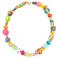 Colorful beaded necklace on a white background