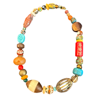 one of one necklace, statement bead necklace, collected bead necklace, artisan necklace, spice market necklace, earthy jewelry, maximalist necklace, wood bead necklace, turquoise statement necklace, boho luxury jewelry, wearable art necklace, eclectic accessories, resort jewelry, boutique jewelry, colorful statement necklace, travel inspired jewelry, chunky bead necklace, globally inspired jewelry, curated accessories, unique artisan necklace