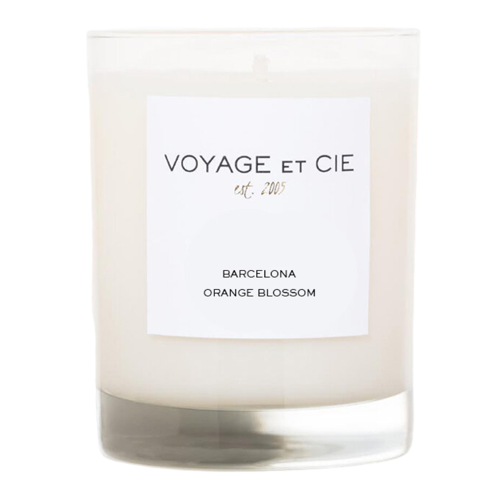 Voyage et Cie candle with a label on a white background