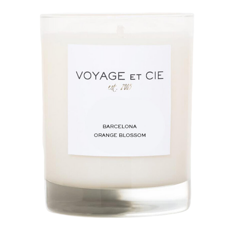 Voyage et Cie candle with a label on a white background