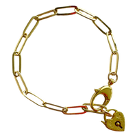 Gold chain bracelet with a heart-shaped padlock charm on a white background
