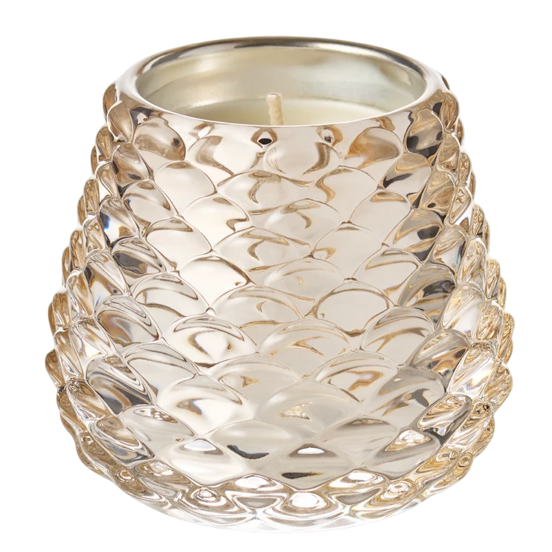 Decorative candle holder with a textured design on a white background