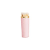 Pink matches with gold cap on a white background