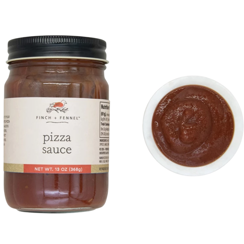 Jar of pizza sauce with a close-up of the sauce on a white background