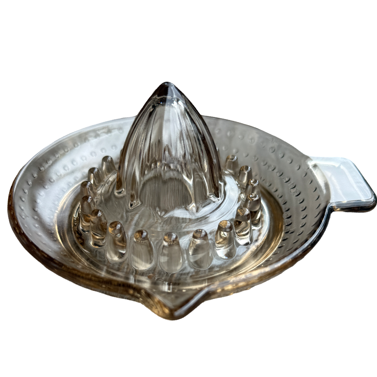 Clear glass citrus juicer on a white background