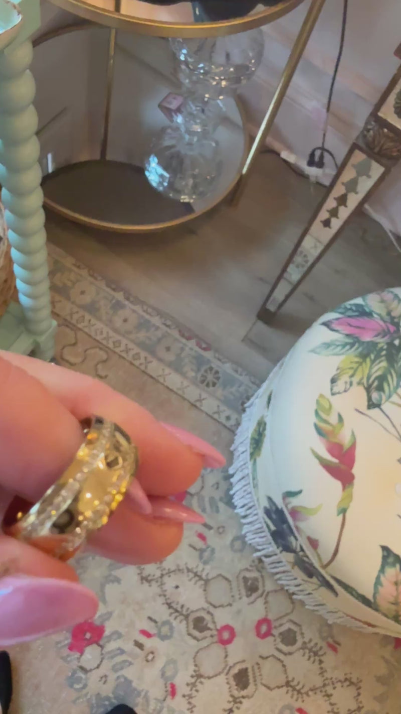 showcasing how the qudo interchangeable jewelry works. this is the qudo lecce ring band and I am showing how the swarovski crystals screw on and off the band