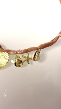 Mandriana bandana necklace, handmade charm necklace, desert chic jewelry, golden cross and heart necklace, boho talisman necklace, cowrie shell necklace, rust bandana jewelry, starfish and horseshoe necklace, symbolic charm choker, one-of-a-kind boho accessories