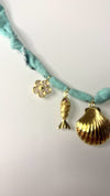 Mandriana, scarf necklace, shell charm necklace, ocean inspired jewelry, coastal style accessory, seafoam green bandana necklace, fish charm, horseshoe necklace, beachy boho jewelry, handmade charm necklace, unique summer necklace, mermaidcore accessory, one of a kind jewelry, artisanal necklace
