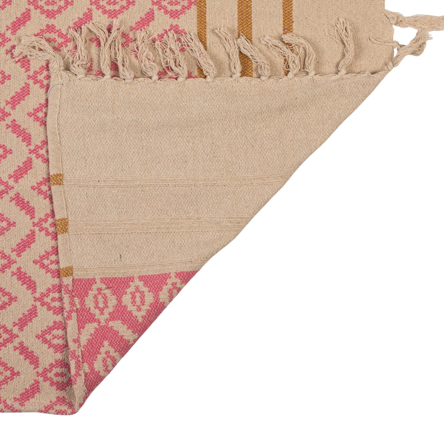 Close-up of a folded fabric with pink and beige pattern on a white background