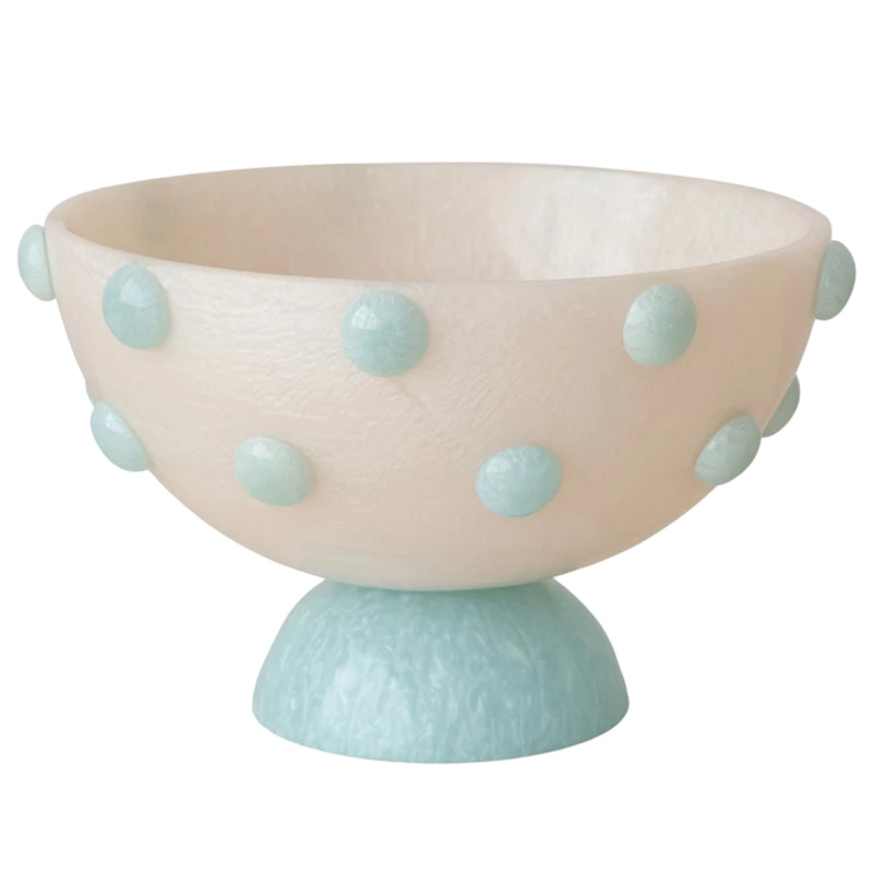 Decorative bowl with light pink top and light blue base, featuring light blue polka dots.