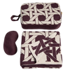 Set of travel items including a patterned eye mask and pouch on a white background