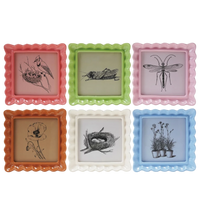 Set of six colorful picture frames with nature-themed illustrations on a white background