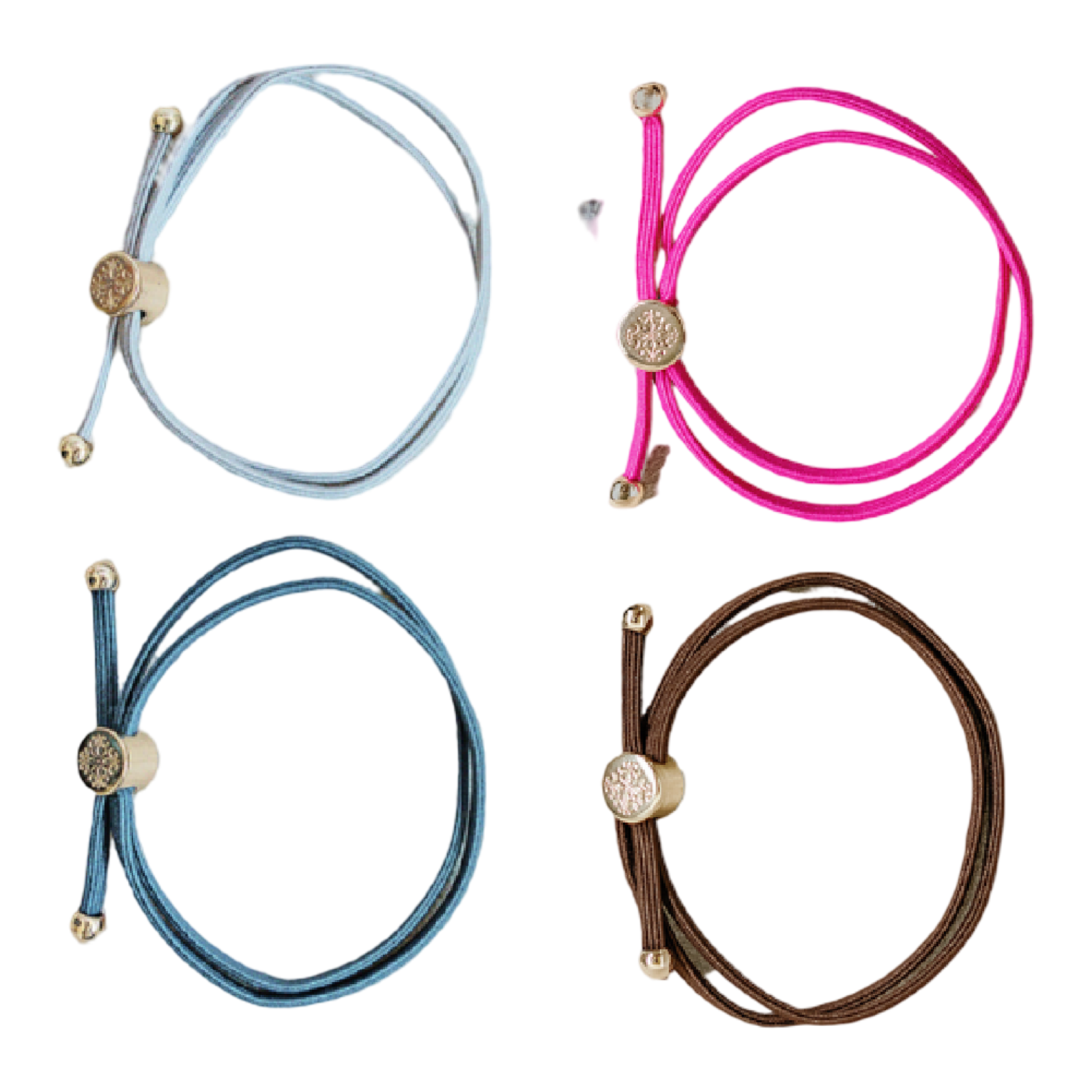 Four colorful bracelets with decorative ends on a white background