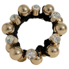 Hair tie with gold beads and crystals on a white background