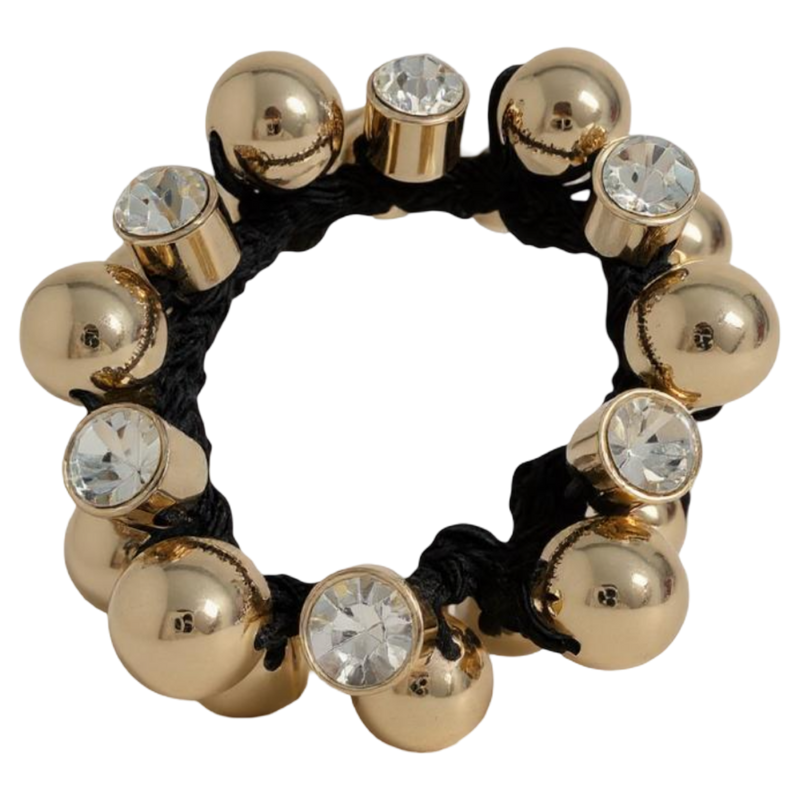 Hair tie with gold beads and crystals on a white background