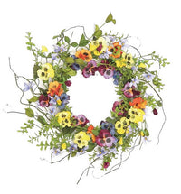 Colorful flower wreath with green leaves on a white background