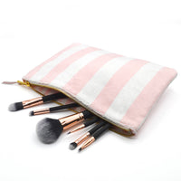terry flat pouch, cotton terry travel pouch, beach club accessory, large makeup pouch, slim travel organizer, zippered pouch for wet swimsuits, wipe-clean pouch interior, gold hardware pouch, travel pouch gift idea, chic beach bag insert