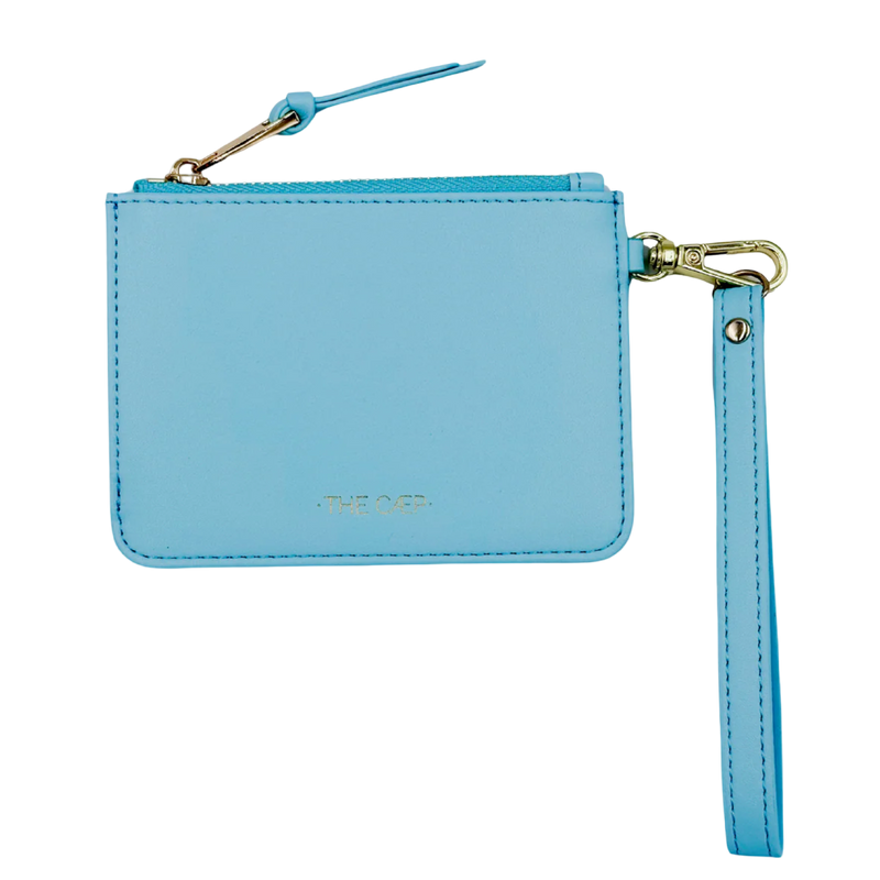 Light blue wristlet with a strap on a white background