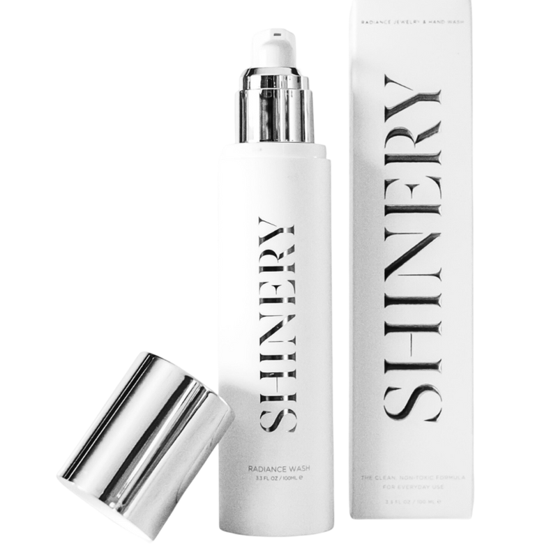 Shiny skincare product with packaging labeled 'Shinery' on a white background
