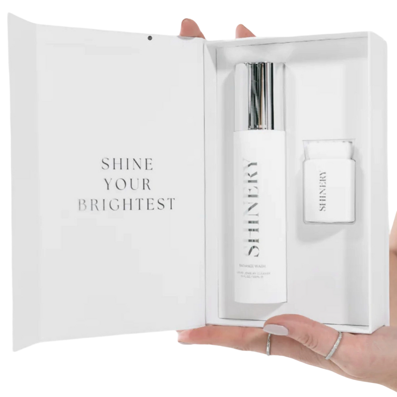 Shiny skincare product set in a white box with 'Shine Your Brightest' text.