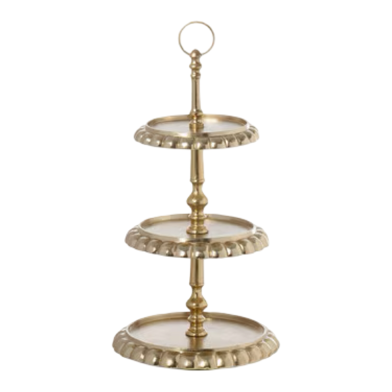 Three-tiered decorative stand with gold and glass finish on a white background
