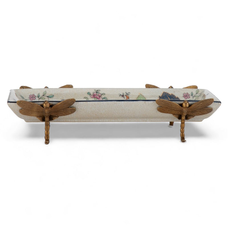 Decorative ceramic tray with wooden dragonfly handles on a white background