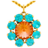 Gold pendant with orange central stone and turquoise stones on a white background