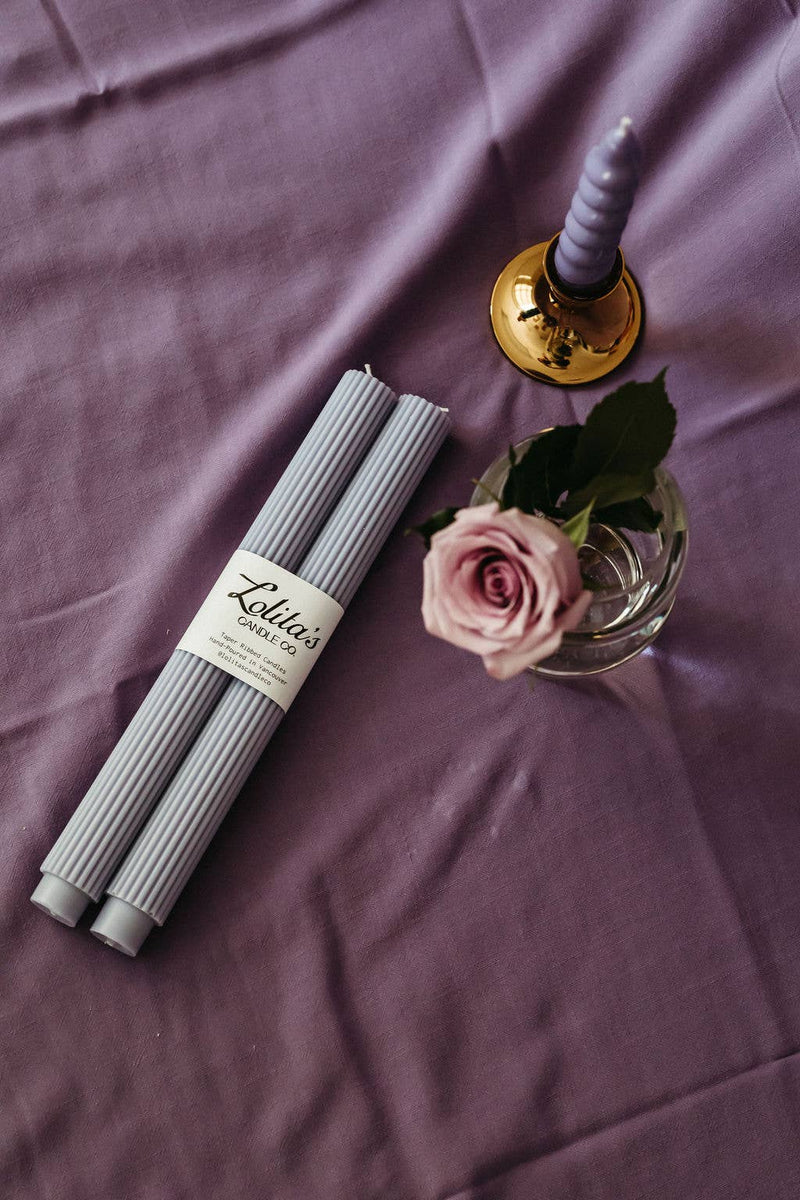 unscented lilac pillar candles, soy beeswax taper candle, eco-friendly taper candles, clean burning decorative candle, sculptural lilac candles, hand poured candle set, pastel purple home decor candles, Rome pillar candle lilac, natural wax dripless candle, non-toxic table candles
