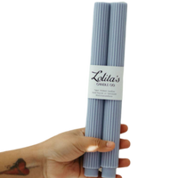 unscented lilac pillar candles, soy beeswax taper candle, eco-friendly taper candles, clean burning decorative candle, sculptural lilac candles, hand poured candle set, pastel purple home decor candles, Rome pillar candle lilac, natural wax dripless candle, non-toxic table candles