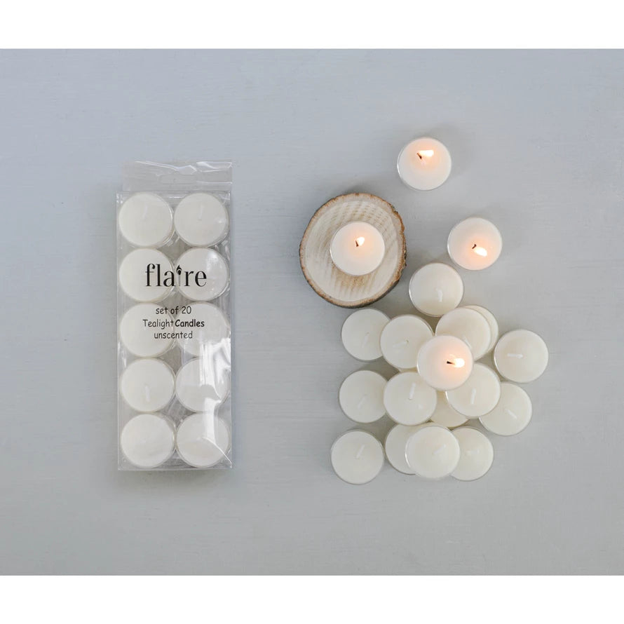 Flare brand teacandle packaging with lit candles on a gray background