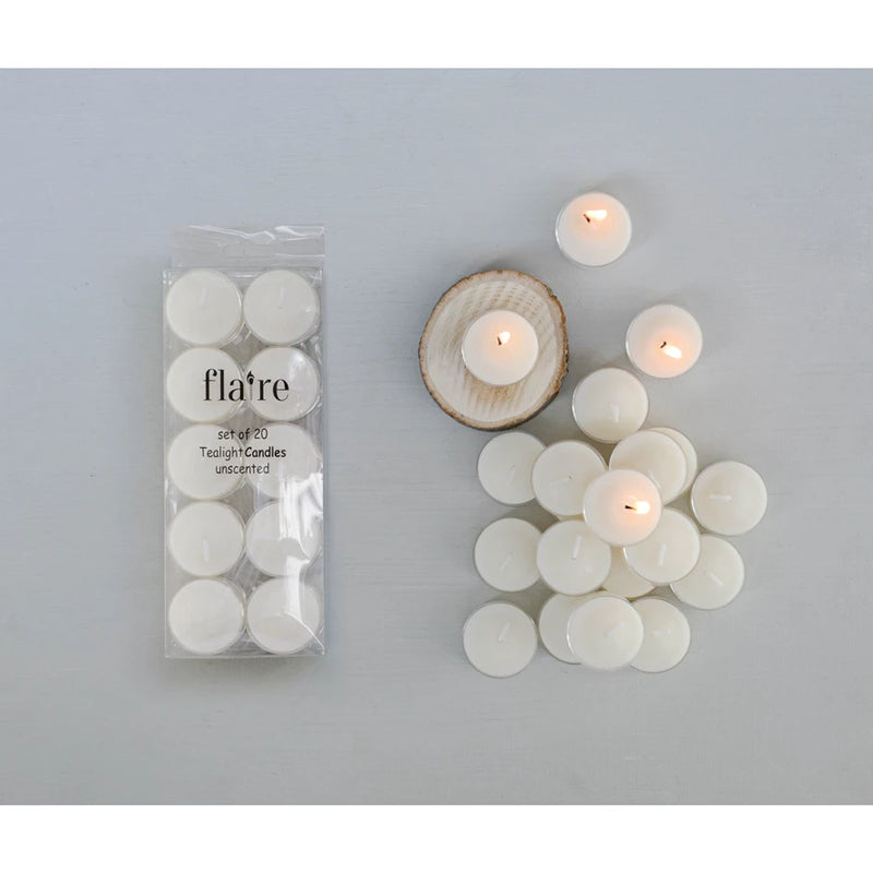 Flare brand teacandle packaging with lit candles on a gray background