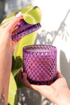 vanilla orchid cedarwood candle, floral woodsy candle, 2-wick luxury candle, purple glass candle with lid, amber musk candle scent, elegant lidded candle, cedar and vanilla home fragrance, reusable glass candle jar, warm floral scented candle, orchid musk balsam candle