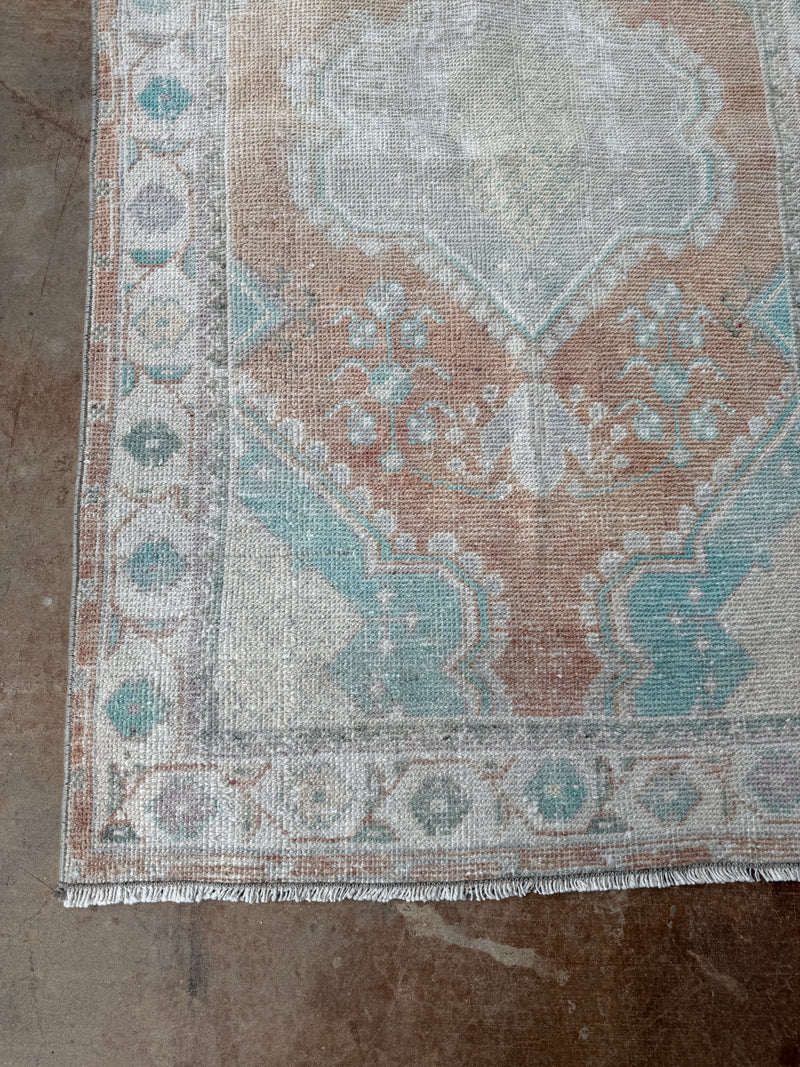 vintage Turkish rug, 4x6 rug, small accent rug, faded terracotta rug, aqua medallion rug, handwoven Turkish rug, boho rug, layered rug look, one of a kind rug, vintage home decor, entryway rug, kitchen runner, neutral Turkish rug